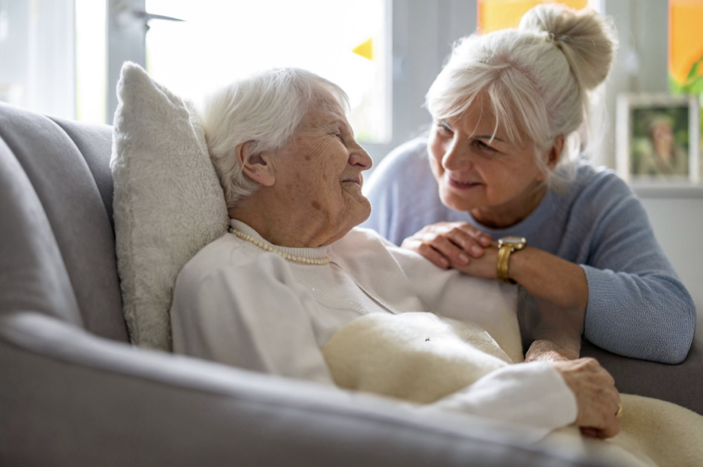 Helfie AI app on smartphone showing Caring for Ageing Parents: Why the Load Feels So Heavy and How to Get the Suppor